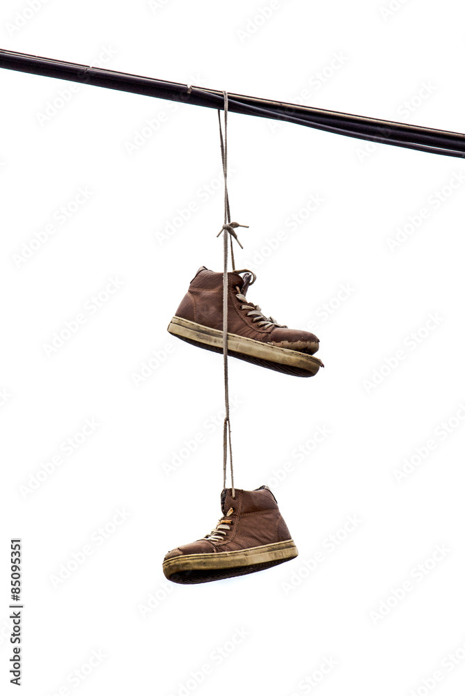 Shoe Tossing, Old Sneakers Hanging on Wire Stock Photo | Adobe Stock