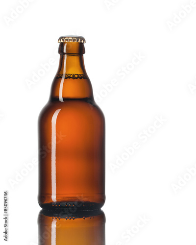 Glass bottle of beer on a white background.