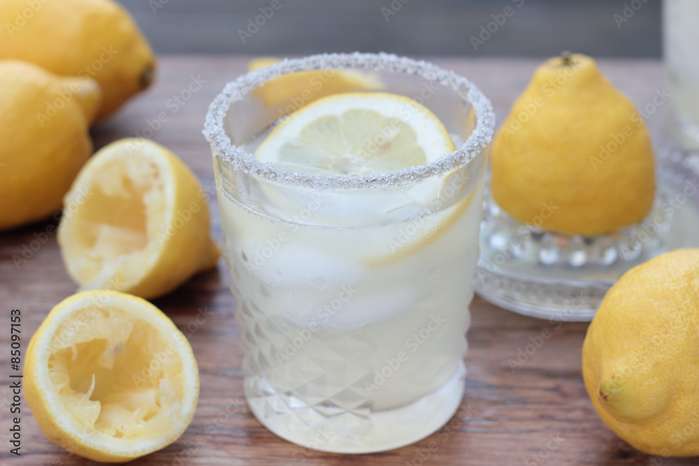 Glass of freshly prepared, cold and refreshing lemonade.