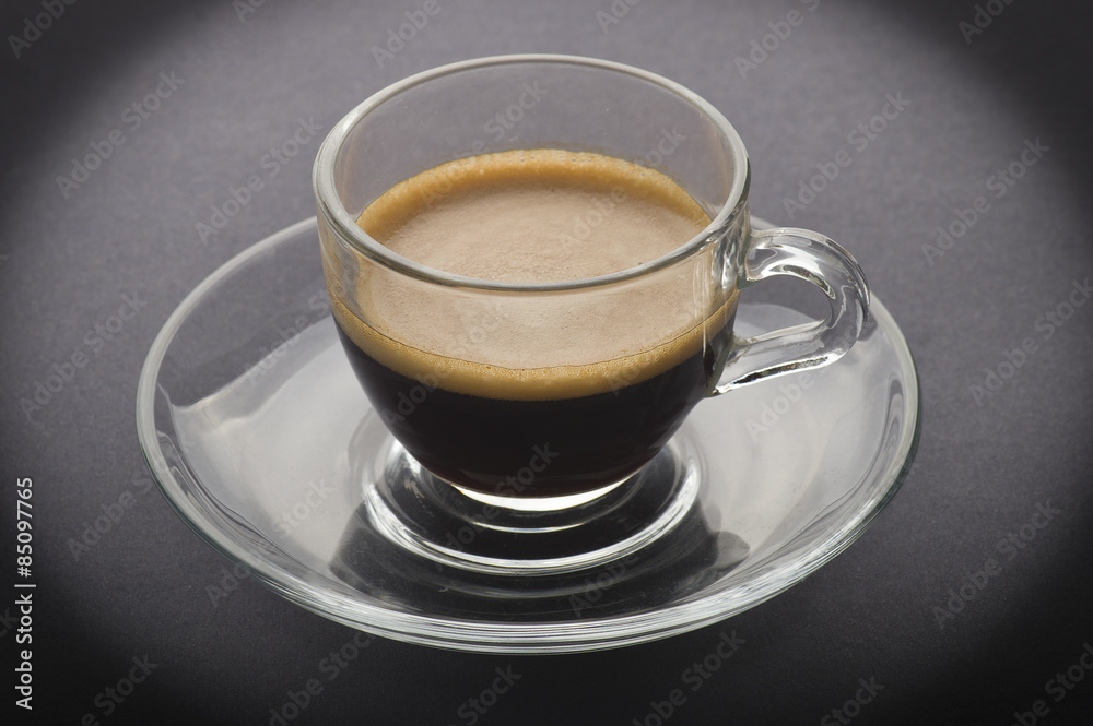 Fototapeta premium Cup of coffee on the black background