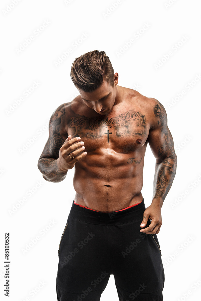 Fototapeta premium Shirtless muscular man with tattoos