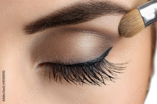 Fotografie Makeup close-up. Eyebrow makeup, brush.