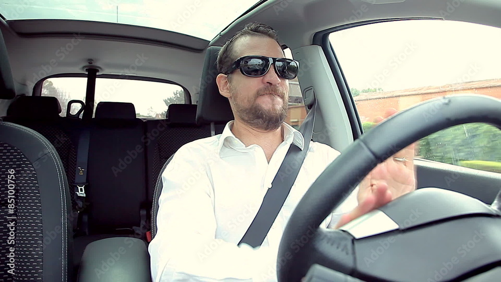 Man screaming yes while driving car Man screaming yes while driving car