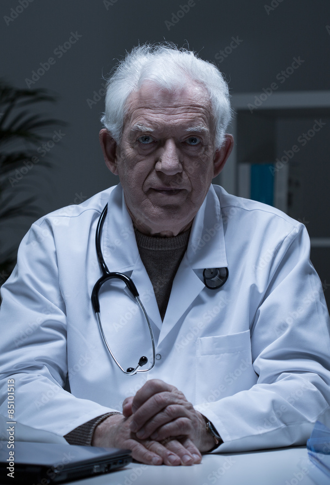 Older serious doctor Older serious doctor