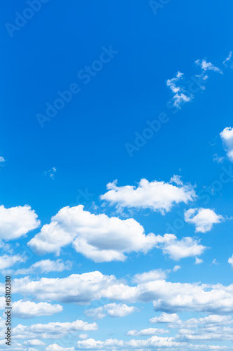 little white clouds in summer blue sky
