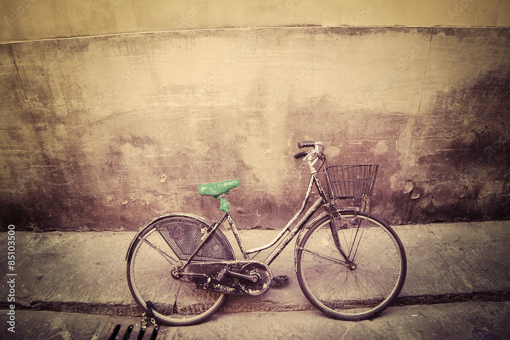 old bicycle in a rustic street in Florence