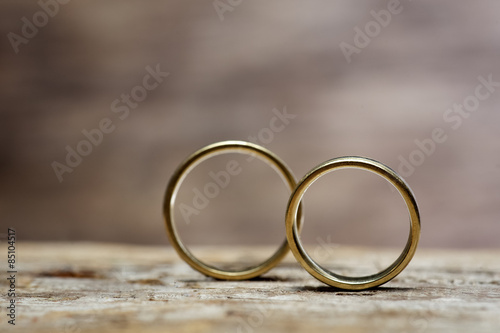 Wedding rings on wood