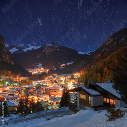 Winter landscape of village in the mountains photo