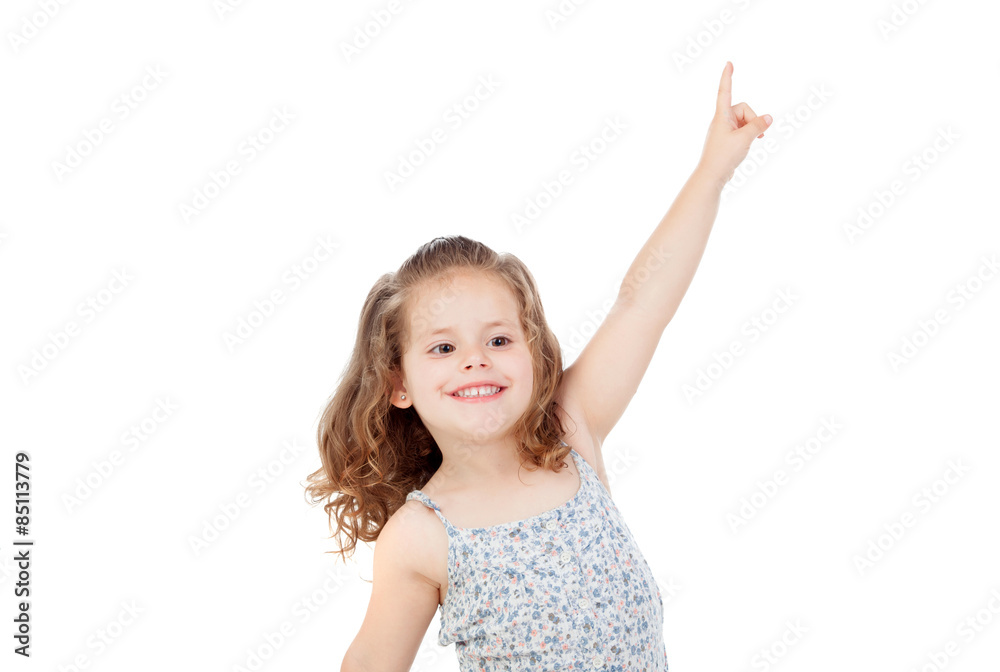 Happy little girl indicating something with the finger Happy little girl indicating something with the finger