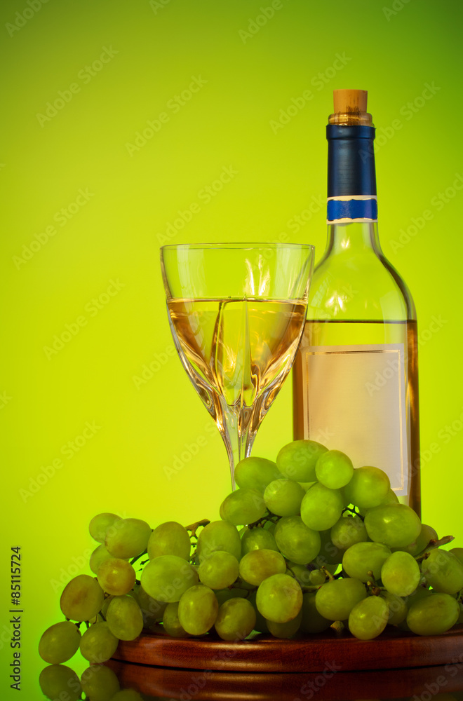 bottle and glass of wine, grape bunch