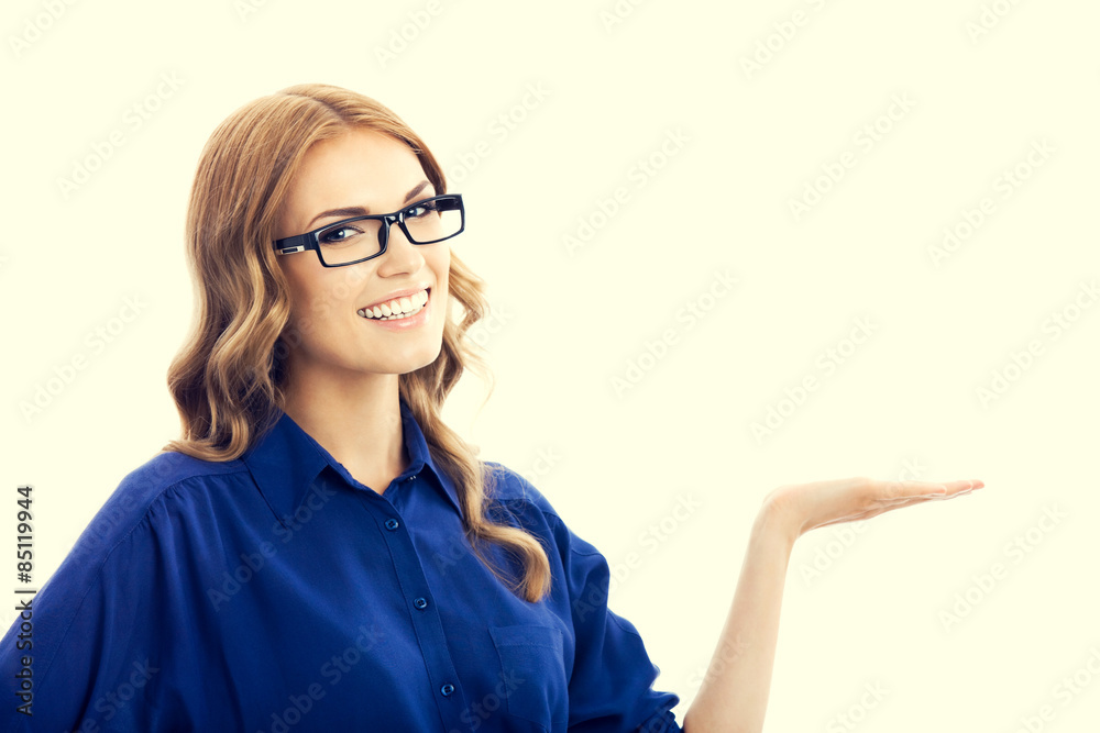young woman showing something or copyspace young woman showing something or copyspace