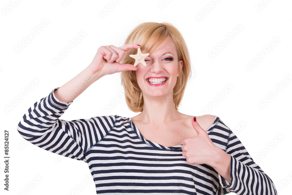 Young funny woman holding sea star and smiling, waiting vacation Young funny woman holding sea star and smiling, waiting vacation