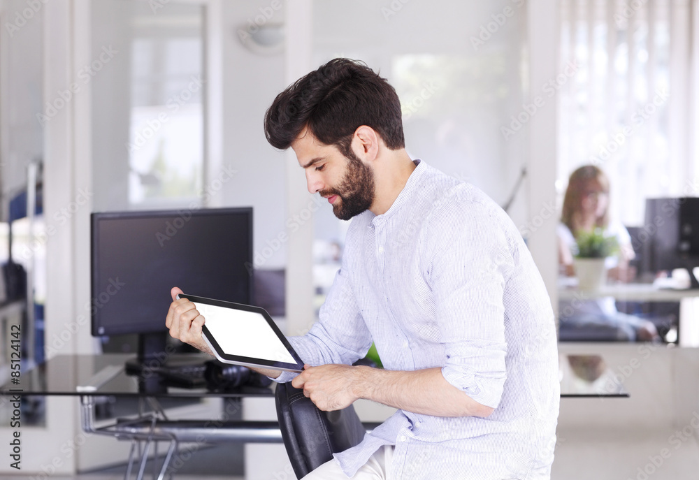 Young businessman with digital tablet Young businessman with digital tablet