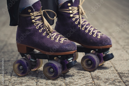female legs in roller skating