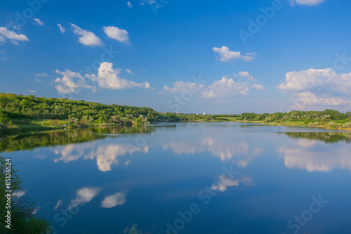 Fototapeta Naklejka Na Ścianę i Meble -  Calm beautiful rural landscape with a lake 