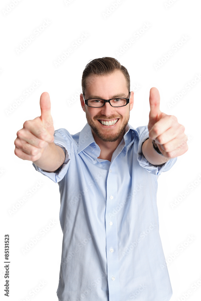 Good looking man in a shirt with two thumbs up against white back Good looking man in a shirt with two thumbs up against white back