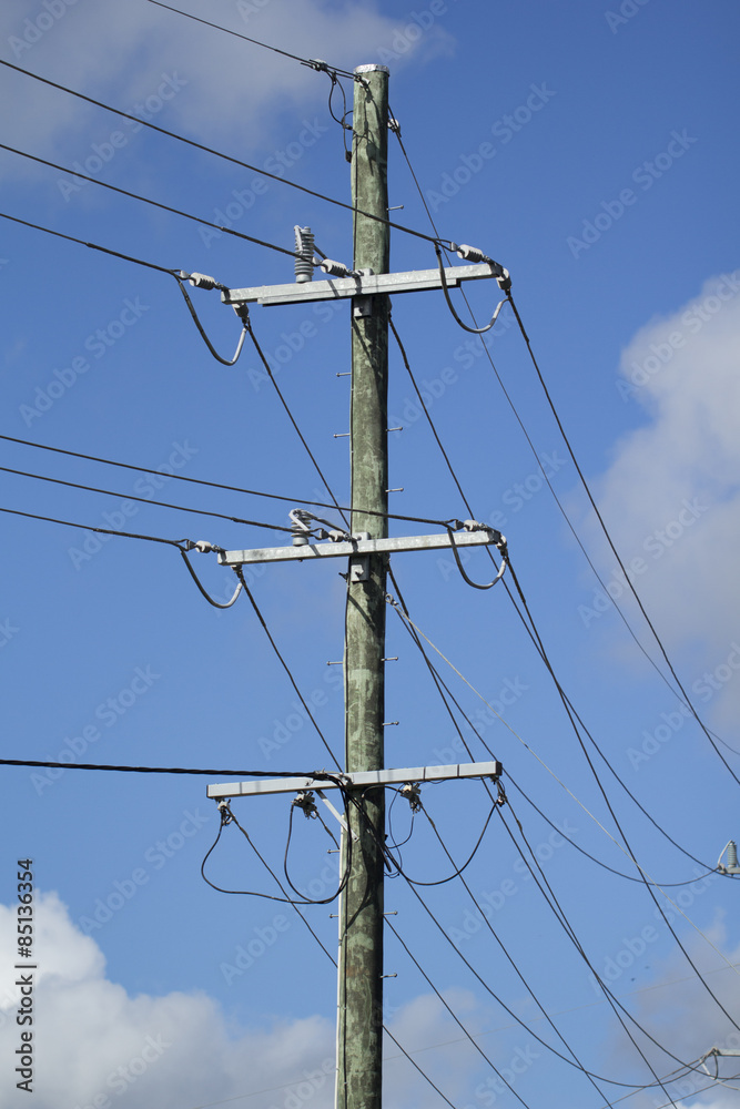 Electricity post with clear blue sky Electricity post with clear blue sky