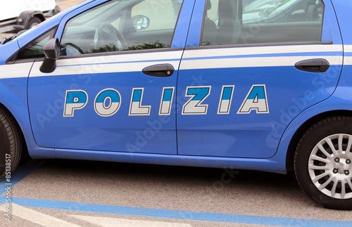 italian blue police car in the street