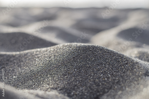 Cuadro en lienzo Volcanic black sand abstract and blurred closeup