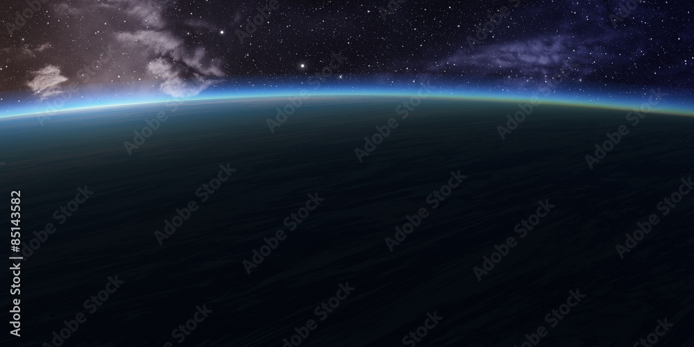 Blue planet with nebula on background.