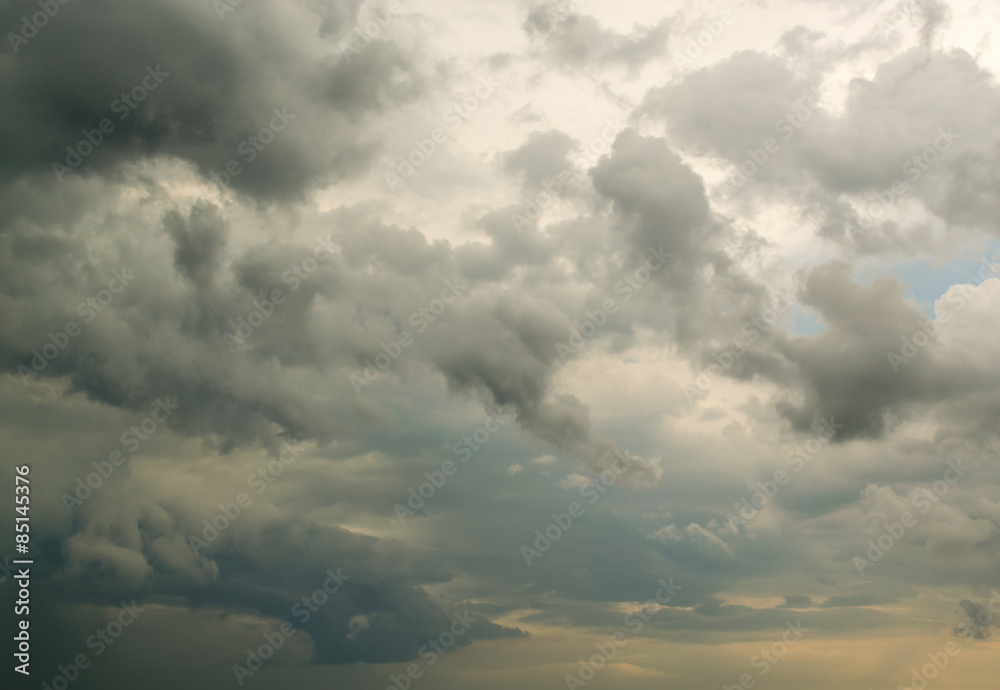 Fluffy Rain Clouds Against Cloud Filled Sky