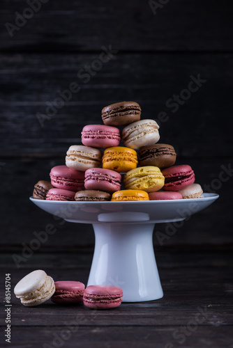 Stack of vibrant fresh macaroons on platter