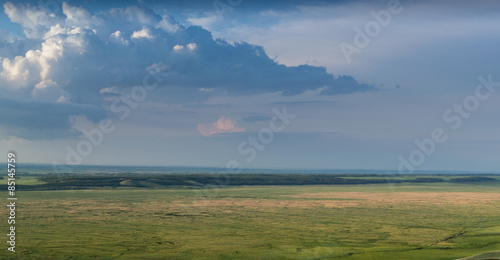 Big Rain Clouds Gather Over a Steppe photo