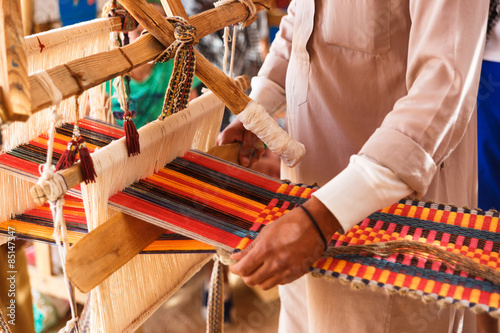 Man produces the fabric photo