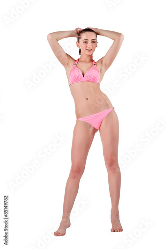 Beautiful young woman in pink swimwear