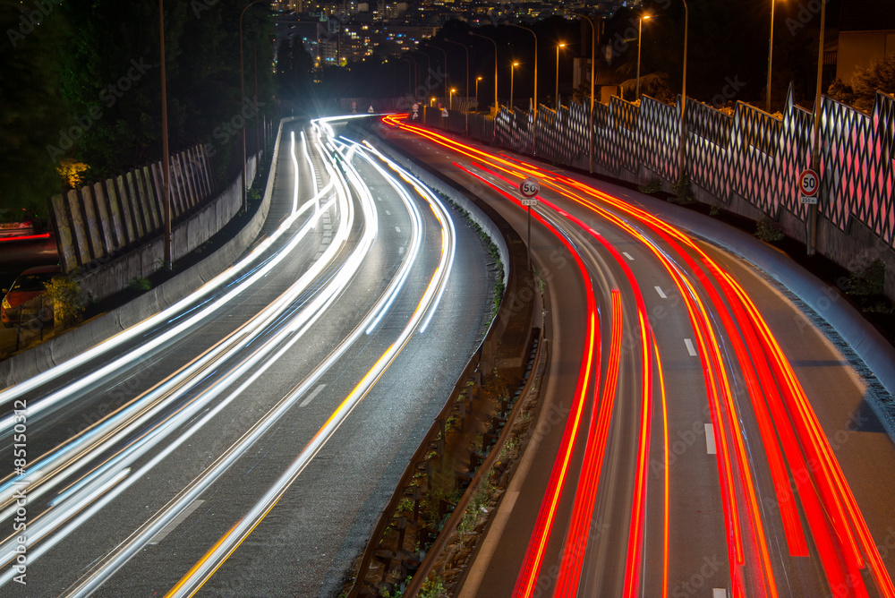 Light trails of cars on a highway