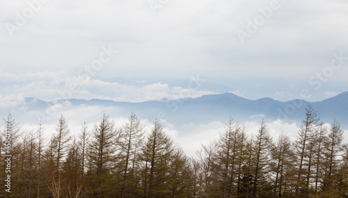 Fototapeta Naklejka Na Ścianę i Meble -  Clouds over mountain tops Panoramic view