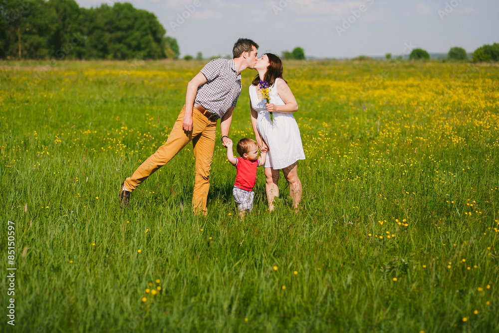 Pregnant family of three in expectation of baby Pregnant family of three in expectation of baby