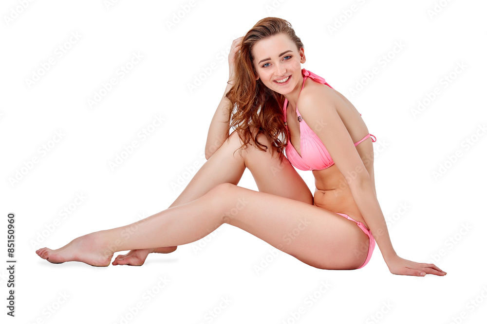 Beautiful young woman in pink swimwear