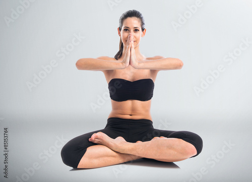 Young woman in lotus position