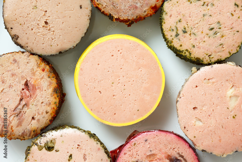 A variety of round pates on plate. From above. A variety of round pates on plate. From above.