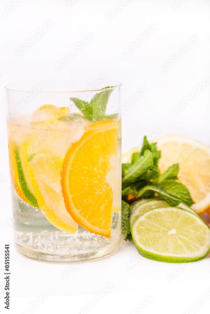 fresh cold cocktail in glass with sliced citus fresh cold cocktail in glass with sliced citus