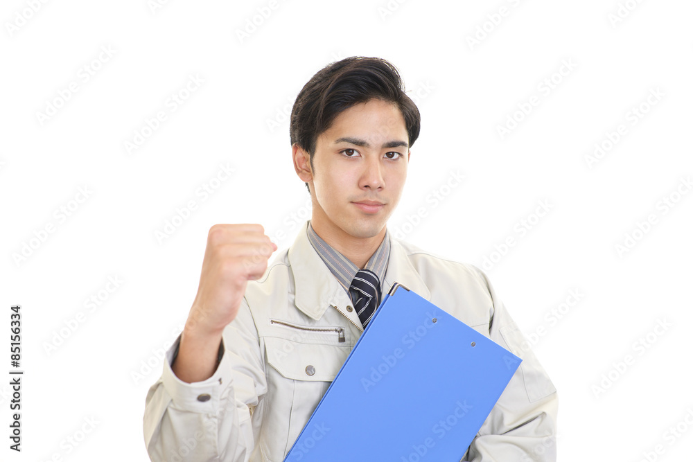 ガッツポーズの作業員