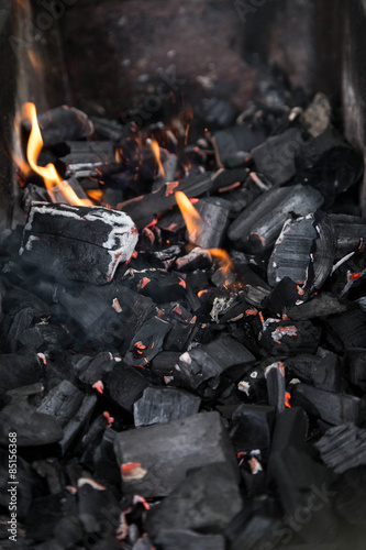 hot close up charcoals in barbecue