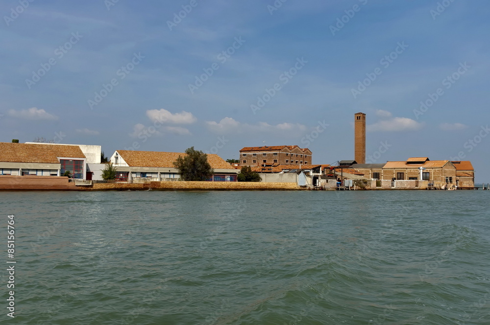 Part of Murano island view from one boat in the lagoon, Italy.