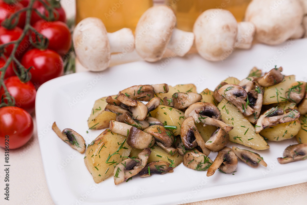 hot potato and mushroom with garnish on white plate hot potato and mushroom with garnish on white plate