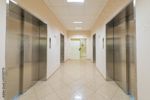 entrance of a residential building with an elevator