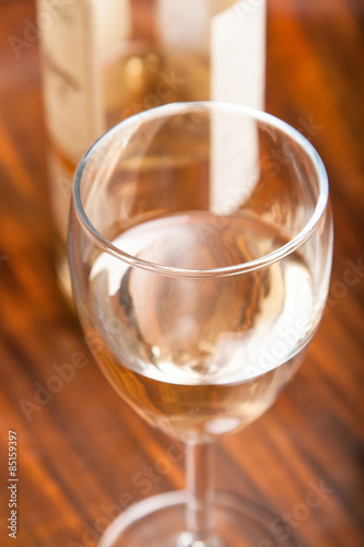 glass and bottle white wine
