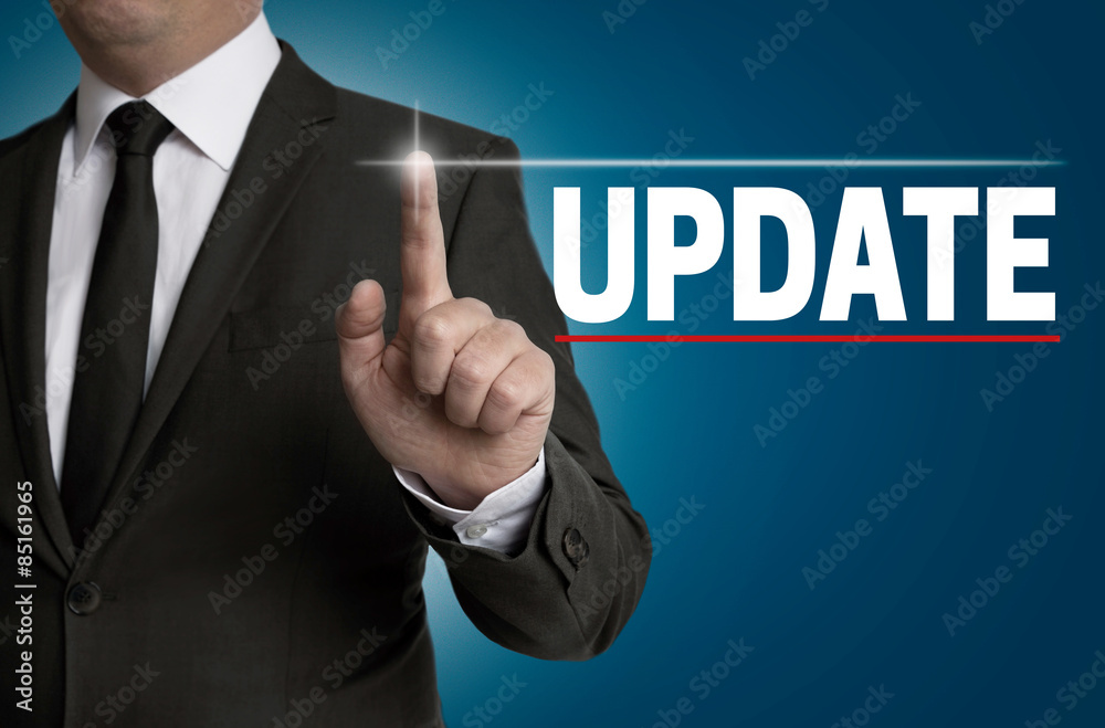 Update touchscreen is operated by businessman Update touchscreen is operated by businessman