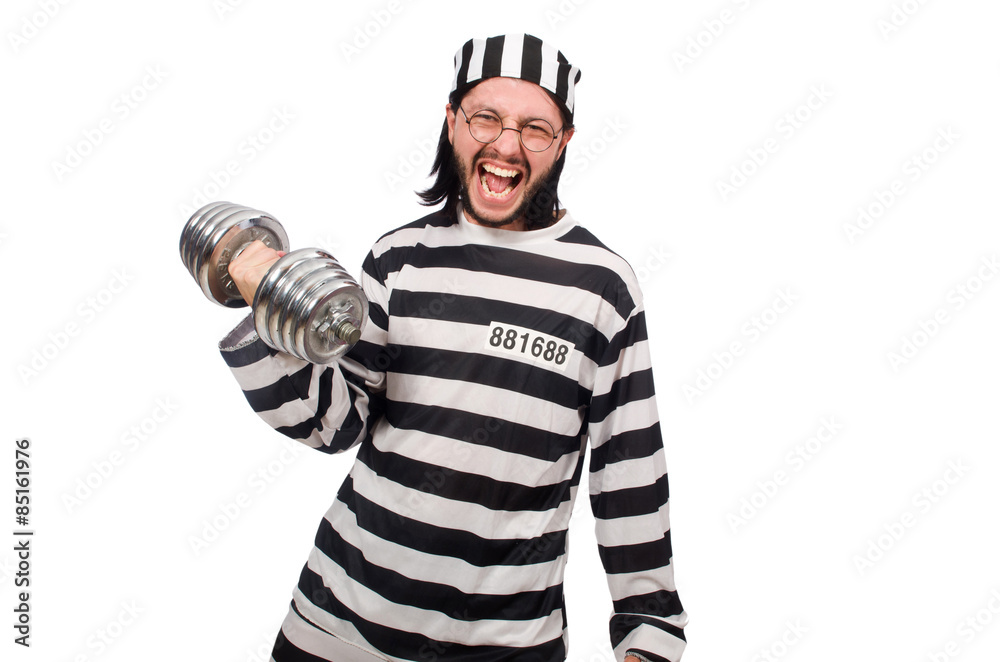 Prison inmate with dumbbells isolated on white Prison inmate with dumbbells isolated on white