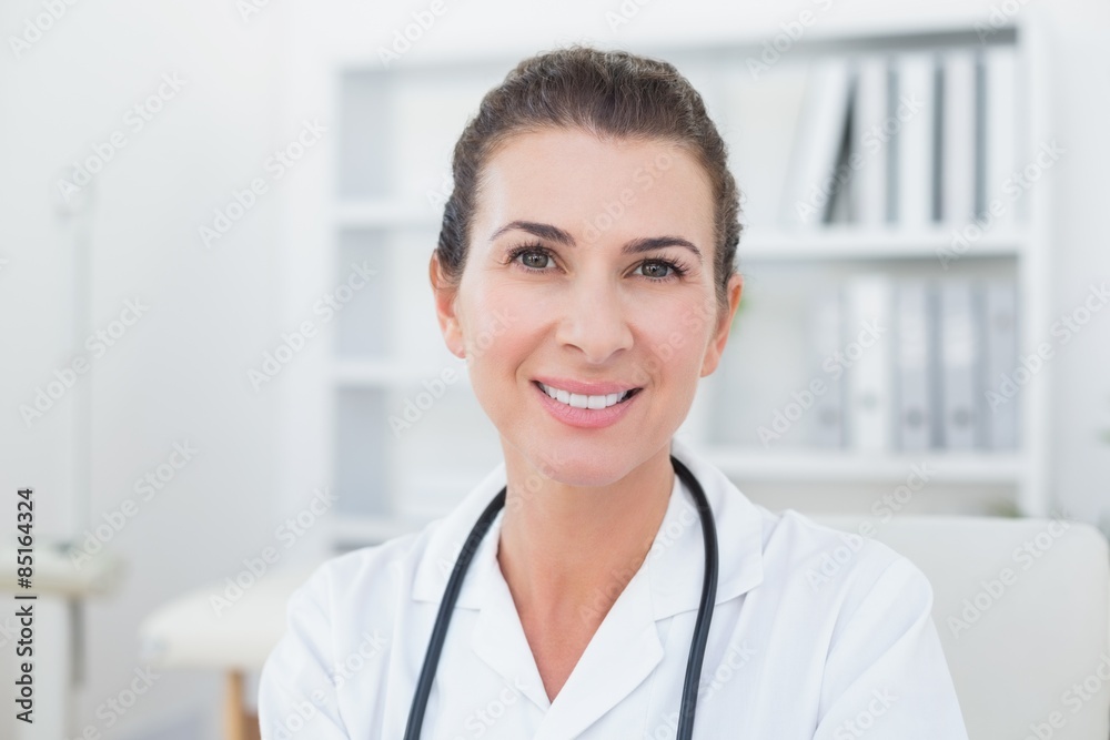 Smiling doctor looking at camera Smiling doctor looking at camera