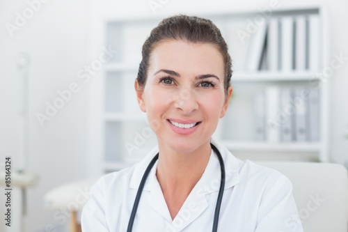 Smiling doctor looking at camera 