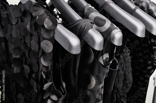 Φωτογραφία black womens clothing hanging on the hanger verticalclothing pas