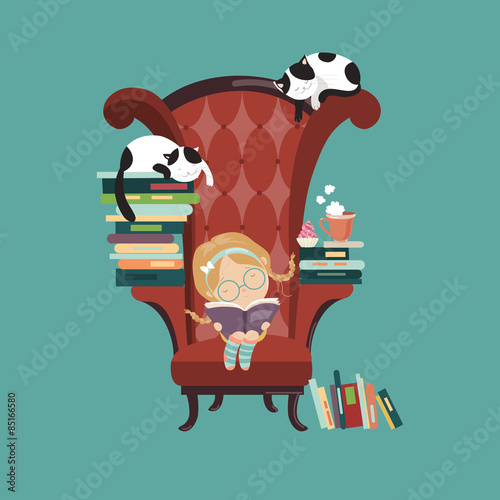 Little girl reading a book