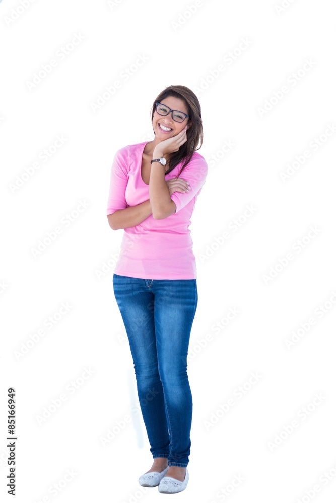 Pretty brunette wearing glasses with one hand on chin Pretty brunette wearing glasses with one hand on chin