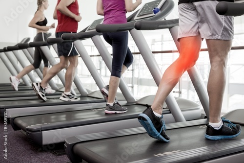 Highlighted knee of man on treadmill